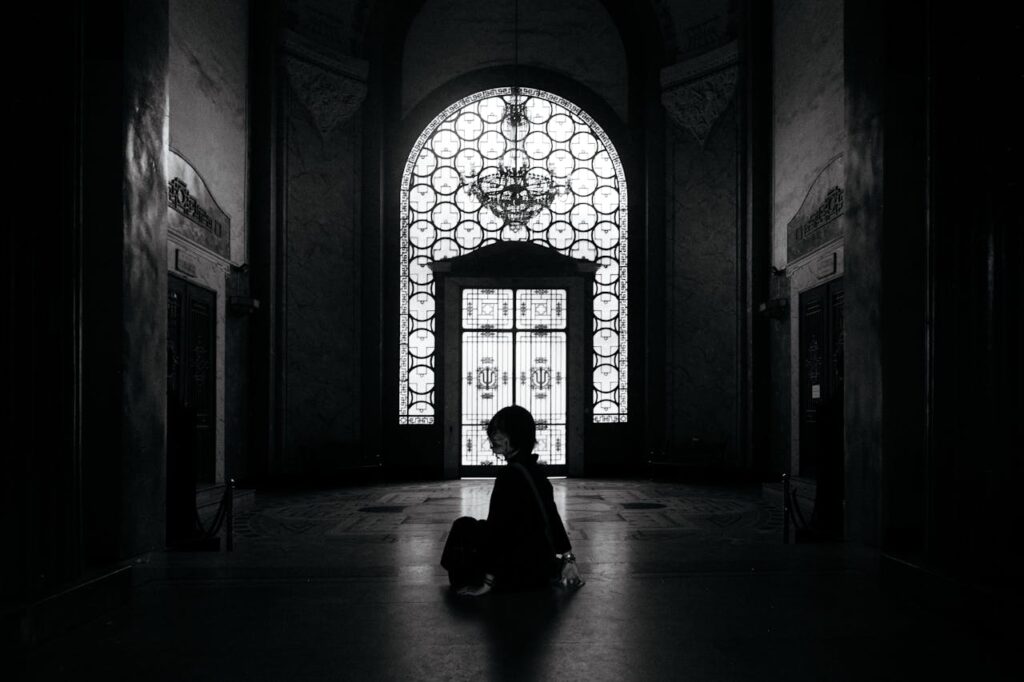 Captivating black and white silhouette inside a grand hall in Hanoi, Vietnam.