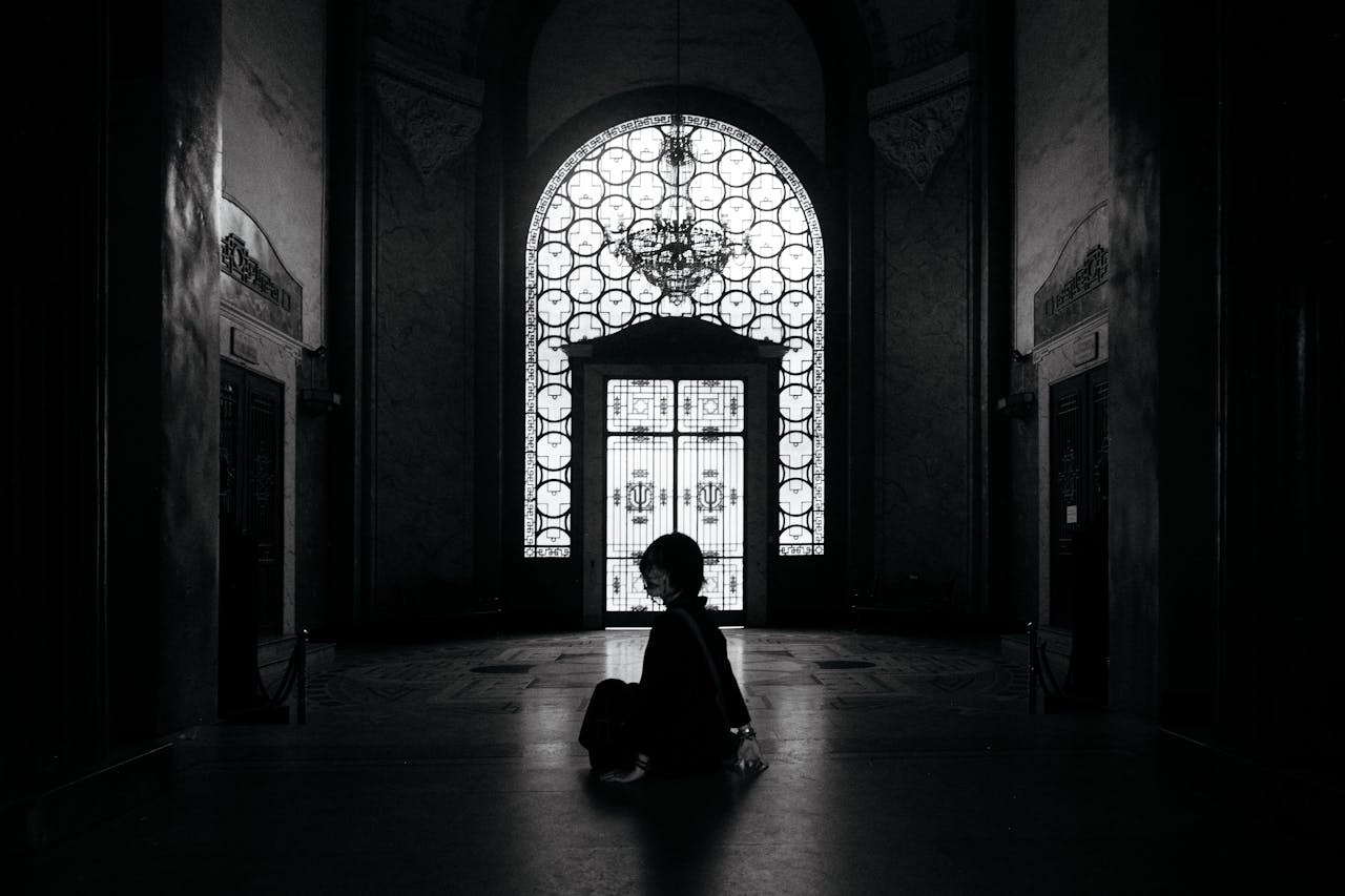 Captivating black and white silhouette inside a grand hall in Hanoi, Vietnam.